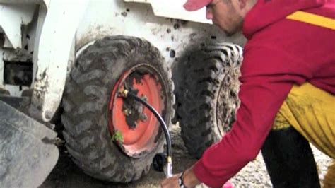 how to re bead skid steer tire with home compressor|youtube tire bead removal.